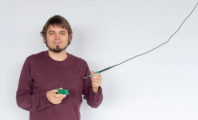 Employee David Thaller soldering